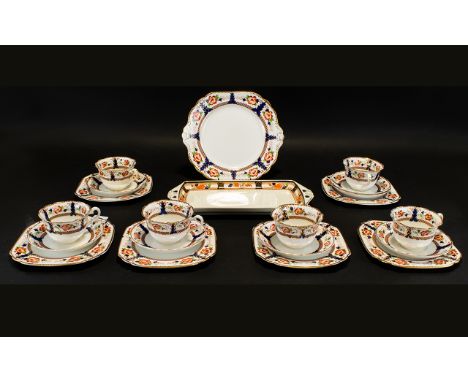 Part Tea Service Tuscan China design comprising 6 tea cups, 7 saucers, 6 side plates and one associated sandwich tray by Wood