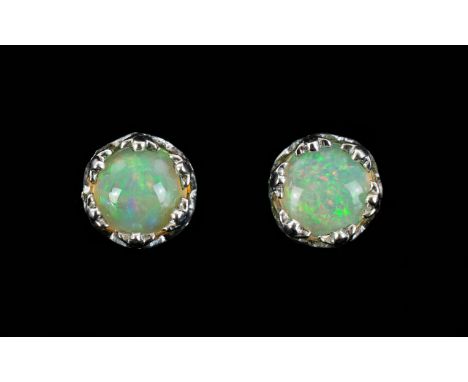 Opal Pair of Stud Earrings, solitaire opals, each set in crown style, platinum vermeil and silver post and push back fittings