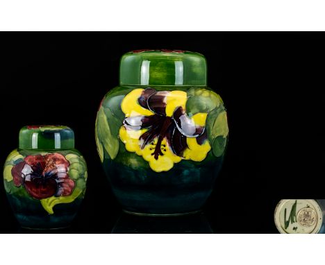 William Moorcroft Signed Tube lined Ginger Jar In The ' Hibiscus ' Pattern. c.1940. Label to Base Reads - Potters to the Late