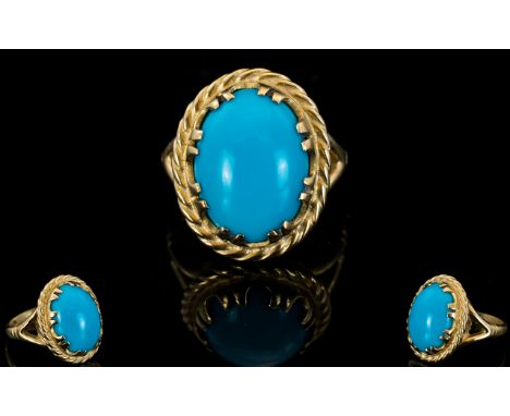 Ladies - 9ct Gold Attractive Turquoise Set Dress Ring, The Large Oval Set - Cabochon Cut Turquoise of Excellent Colour. Fully