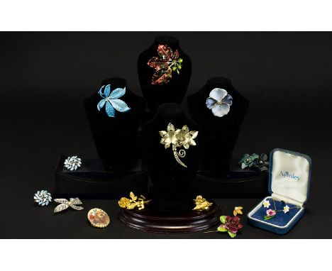 A Collection Of Floral Themed Costume Jewellery A varied collection to include enamel leaf brooch by Exquisite, pale blue flo