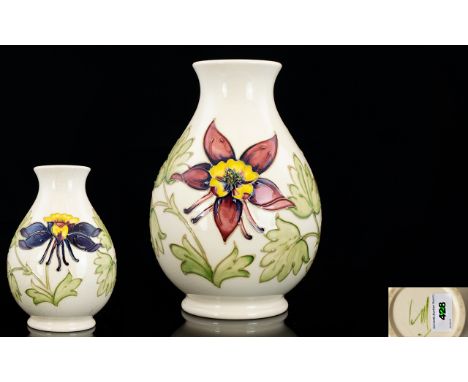 Moorcroft Tube lined Ovoid Shaped Vase ' Columbine ' Design on Ivory Ground. Signed to Underside. c.1980 - 1985. Please See P