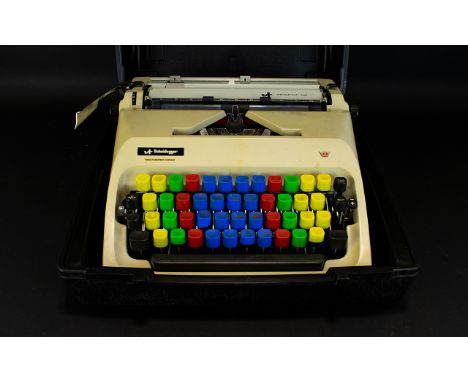 A West German Typewriter by Scheidegger, international 2000 in fitted hard case.