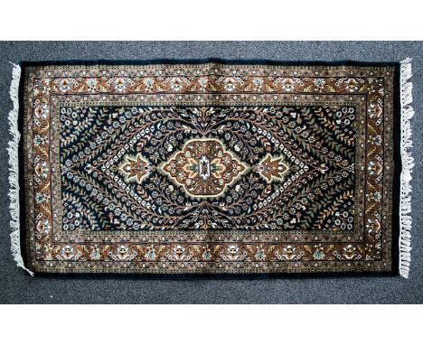 Woven Wool And Silk Blend Carpet Small rectangular rug in traditional Persian design with four border detail on midnight blue