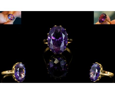 An 18ct Gold And Amethyst Set Cocktail Ring the whole set in raised reticulated mount, inner shank marked for 18ct gold. The 