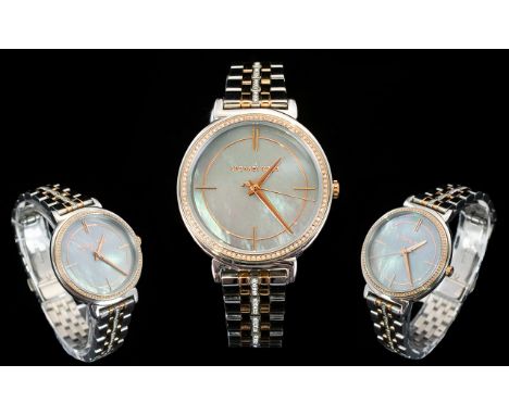 Michael Kors MK 3642 Ladies Cynthia Rose Gold / Silver Tone Bracelet Watch. Features Mother of Pearl Dial, Push Button, Deplo