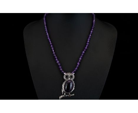 Amethyst 'Owl' Pendant Necklace, a 35ct cabochon cut amethyst forming the body of the owl pendant with a further 60cts of rou