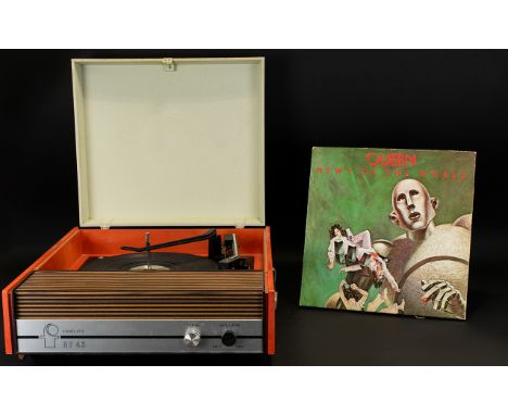 A Vintage Portable Record Player by Fidelity.  Model No. HF43 by Fidelity, tone and volume controls, carry handles to side, h