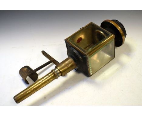 Late 19th/early 20th Century brass and steel coach lamp with wall bracket   Condition: 
