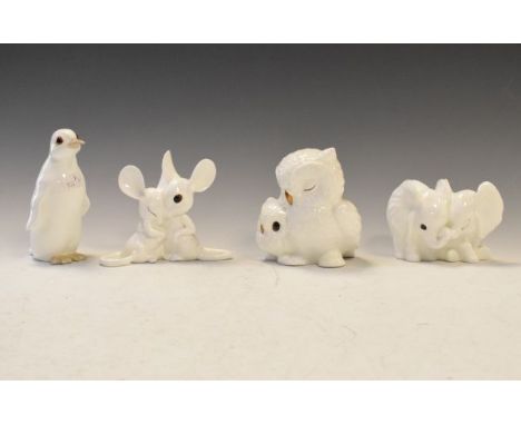 Two Royal Osborne white glazed ceramic animal figures, together with two similar figures by Maruri   Condition: 