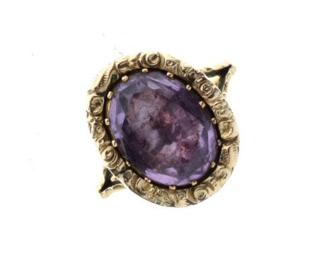 Yellow metal dress ring set oval amethyst-coloured stone, the shank stamped 9ct, size K½, 4g approx gross   Condition: 