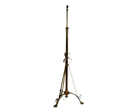 Late 19th/early 20th Century brass telescopic standard lamp on triple splayed supports   Condition: 