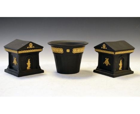 Pair of Wedgwood cane on black basalt Library Collection architectural boxes and covers, 11cm high, together with a similar p