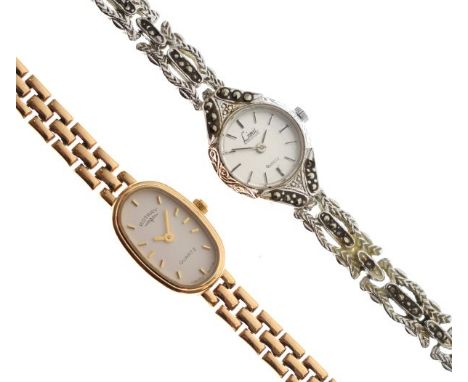Rotary - Lady's 9ct yellow metal wristwatch, the oval dial with gilt baton markers, quartz movement, the flexible bracelet st