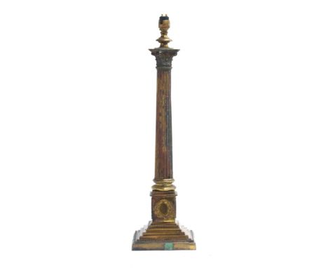 A brass table lamp, corinthian column on a square stepped plinth base with applied wreathes, 56cm high to base of fitting