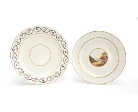 Two W(***) porcelain plates, one hand painted with a landscape castle scene, heightened in gilt, puce crescent and star mark 