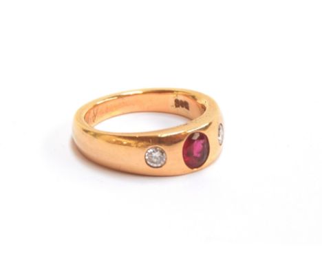 A heavy 14ct gold gypsy ring set with a ruby and two diamonds, the ruby approx. 0.4cts, size M 1/2, 8.2g 