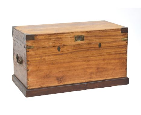 A 19th century camphor wood campaign trunk, with brass corners, and large brass carry handles, 108cm wide, 56cm deep, 61cm hi