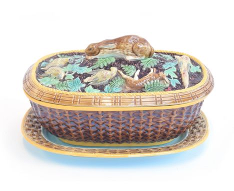 A 19th century Brown Westhead Moore &amp; Co. terrine and stand, with liner, of basket form modelled with game, 22.5cm wide, 