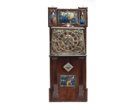 An important Malvern School Arts and Crafts period wall clock, bearing a label to reverse for 'C. E. Jacob, Malvern School of