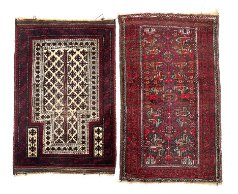 A West Persian prayer mat, 140x90cm; together with a further red ground Persian rug, 150x88cm 