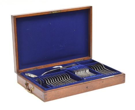 An oak cased canteen of Old English pattern silver flatware by Carrington &amp; Co, London 1897, comprising table forks (11),