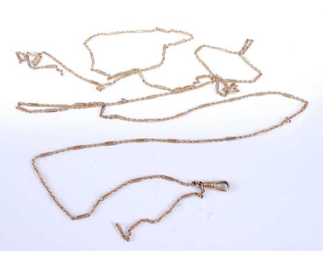 A yellow metal trombone link long guard chain, with swivel clasp, length 1420mm, width 1.75mm, gross weight 20g, stamped and 
