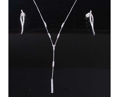 An 18ct white gold diamond pendant and earring set, the pendant comprising 25 round brilliant cut diamonds in articulated bar