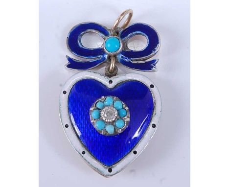 A yellow metal, enamel, turquoise and diamond heart shaped locket, having a centre Old European cut diamond within a border o