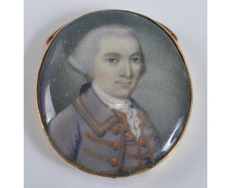 Circa 1800 English school - bust portrait of a gentleman wearing a mauve tunic, miniature watercolour on ivory, 32 x 28mm, in