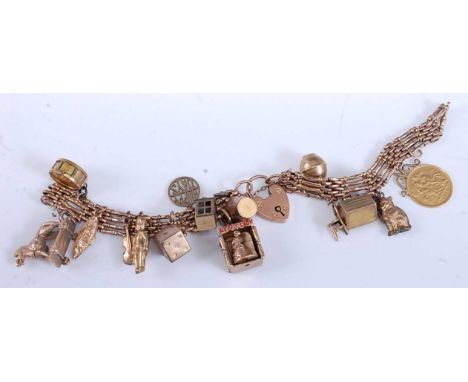 A 9ct yellow gold four-bar gatelink bracelet, with padlock clasp and safety chain, having fifteen charms attached comprising 