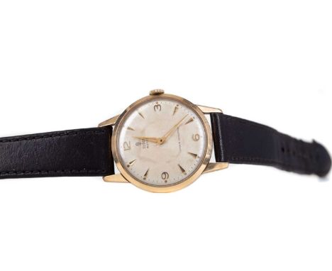 GENTLEMAN'S TUDOR ROYAL NINE CARAT GOLD MANUAL WIND WRIST WATCH,the round cream dial with applied wedge and Arabic hour marke