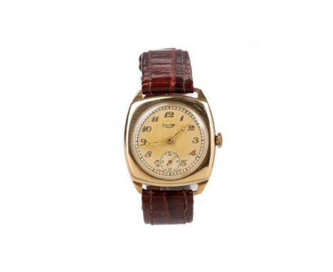 GENTLEMAN'S LIMIT NINE CARAT GOLD MANUAL WIND WRIST WATCHthe round cream dial with applied Arabic hour markers, railroad oute