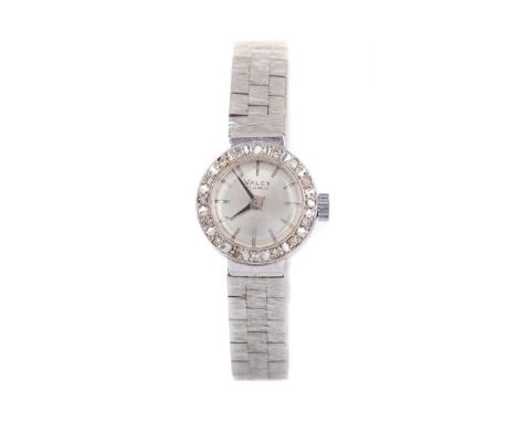 LADY'S VALEX NINE CARAT WHITE GOLD MANUAL WIND WRIST WATCH,the round silvered dial with baton hour markers, 16mm case with di