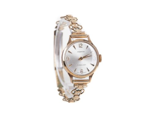 LADY'S INGERSOLL NINE CARAT GOLD MANUAL WIND WRIST WATCH,the round white dial with Arabic and wedge hour markers, 21mm case, 