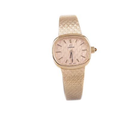 LADY'S OMEGA NINE CRAT GOLD MANUAL WIND WRIST WATCH,the oval champagne dial with baton hour markers, 22mm case, tigers eye se