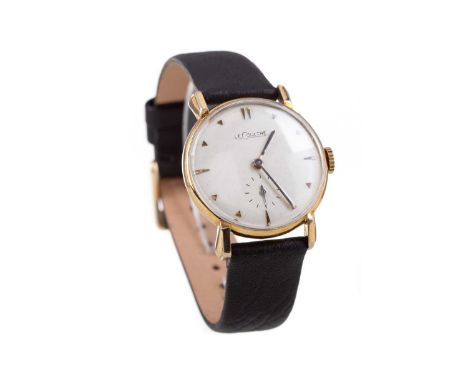 GENTLEMAN'S LE COULTRE GOLD FILLED MANUAL WIND WRIST WATCH,the round white dial with applied wedge hour markers, 29mm case, o