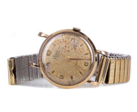GENTLEMAN'S ELCO NINE CARAT GOLD MANUAL WIND WRIST WATCH,the round champagne dial with Arabic and diamond shaped hour markers