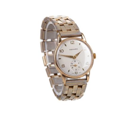 GENTLEMAN'S GARRARD NINE CARAT GOLD MANUAL WIND WRIST WATCH,the round cream dial with Arabic and diamond shaped hour markers,