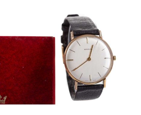 GENTLEMAN'S MARVIN NINE CARAT GOLD MANUAL WIND WRIST WATCH,the round cream dial with baton hour markers, 32mm case, on a blac