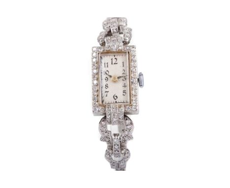 LADY'S DIAMOND MANUAL WIND COCKTAIL WATCH,the rectangular cream dial with Arabic hour markers, outer seconds track in black, 