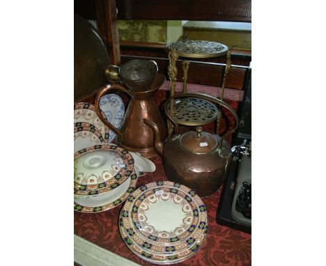 A substantial 19th century copper kettle, a vintage trio of brass brandy, rum and whisky ladles with applied copper labels, a