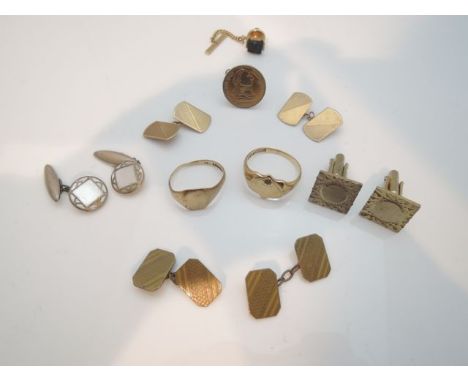 A pair of 9ct gold cufflinks, 3.8g; two gentleman's signet rings, one inset with a paste stone, 8.2g in total; three pairs of