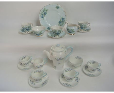 A collection of Shelley coffee wares with printed blue floral decoration comprising coffee pot, milk jug, sugar bowl, six cup