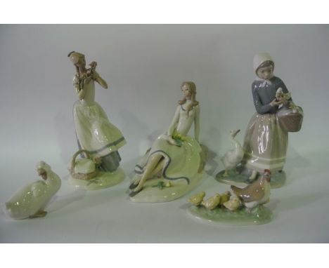 A Lladro Daisa figure of a girl with goose and goslings together with two similar Teresa Spanish style figures of girls with 