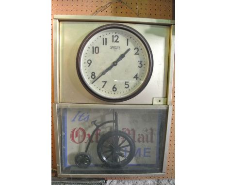 A Smiths electric eight day dial clock with advertising panel for the Oxford Mail