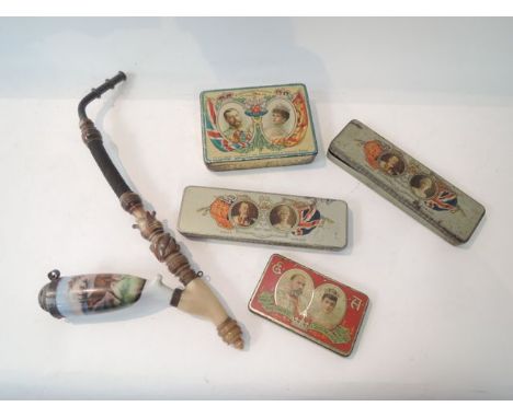 An Austrian turned horn work pipe, with ceramic bowl and printed detail and 4 Royal commemorative tins, 1902 & 1911 Coronatio