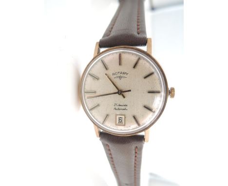 A gentleman's 9ct gold wristwatch, Rotary, automatic, the silvered dial with black and gilt baton numerals, on a later brown 
