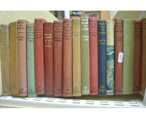 W E Johns, sixteen volumes of Biggles including Biggles Sees It Through, first edition