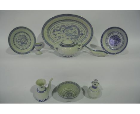 An extensive collection of contemporary Chinese blue and white dinner, tea and other wares with dragon decoration comprising 